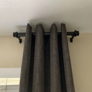 Pair of side mount drapery rods